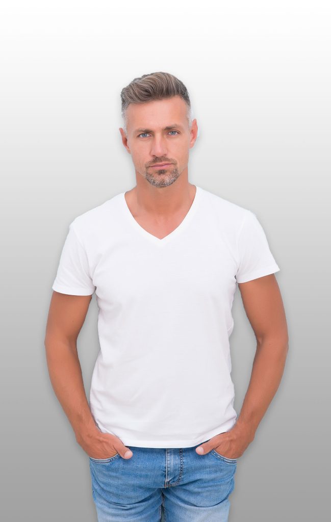 male model in white shirt looking at camera
