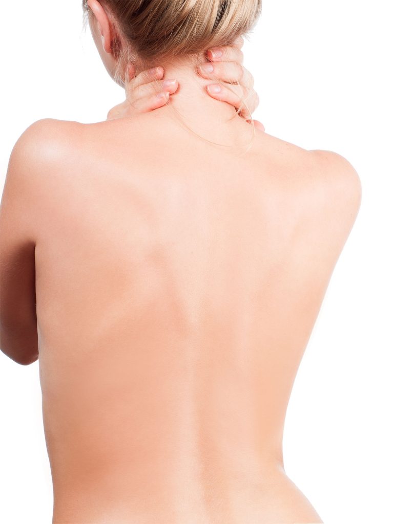 A woman's back that contains no moles.