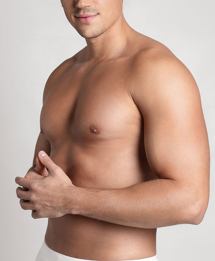 A shirtless man posing as a model for body contouring.