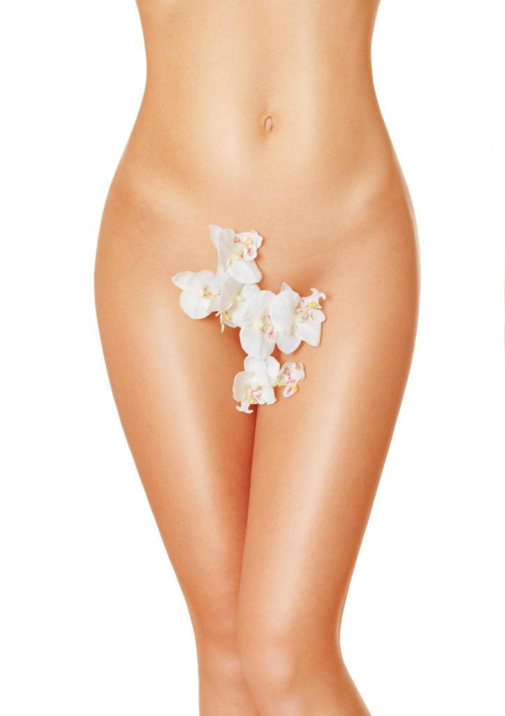 A woman's body adorned with strategically placed flowers.