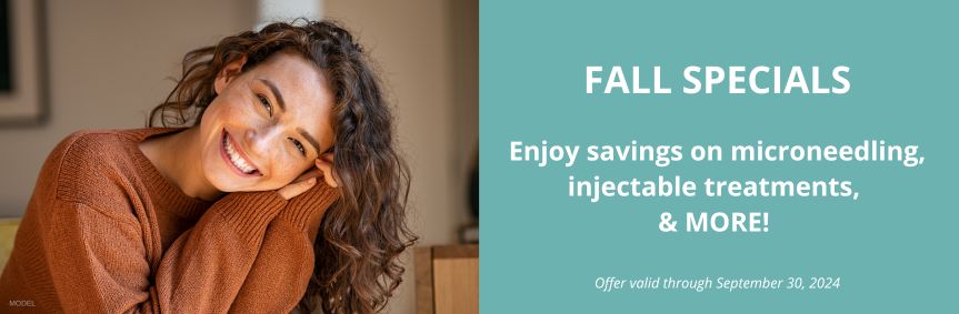 Fall Specials - Enjoy savings on microneedling, injectable treatments, & MORE! (woman in cozy sweater smiles at camera)